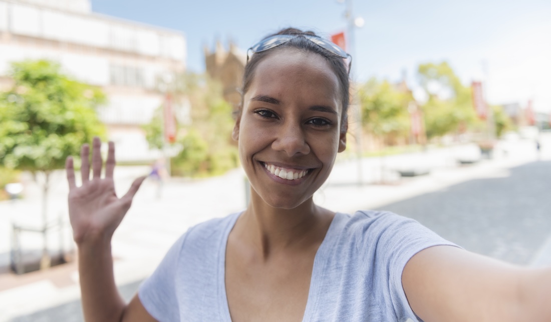 Color image of an Aboriginal Australian female student making a selfie.